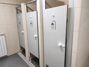 a row of lockers in a bathroom at Beddy Hostels in Madrid