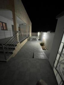 an empty hallway of a building at night at Villa BBS in Ghlissia