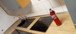 a bottle of ketchup sitting on top of a kitchen counter at Saarlouis in Saarlouis