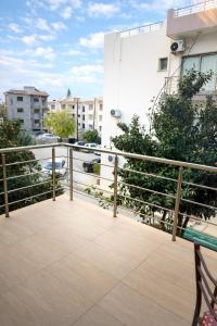 a balcony with a view of a building at Lapta SEL in Ayios Dhometios