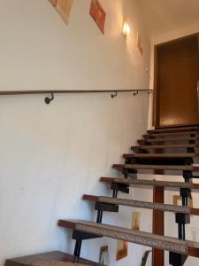 an empty room with stairs and a door at Burato`s Haus in Minden +5 photos