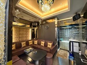 a living room with a couch and a table at 木木 Lin in Chiayi City