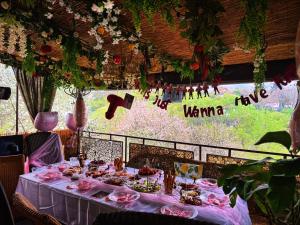 a table with food and a sign that says have wanna at Къща за гости Дени in Chukovezer +115 photos