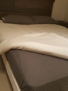 a close up of a bed in a room at Departamento La Serena in Coquimbo +49 photos