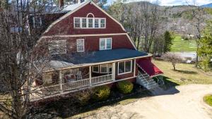 an aerial view of a red house at Inn at Jackson in Jackson