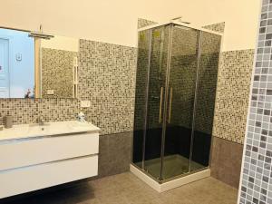 a bathroom with a shower and a sink at Domus Alberta in Lecce +76 photos