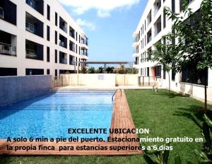 a picture of a swimming pool in a building at Apart duplex Cala Busquets in Ciutadella