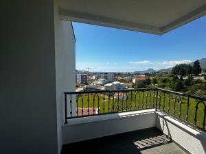 a balcony with a view of a city at Dali Apartment in Bar