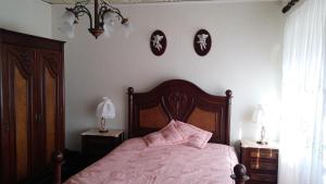 Tempat tidur dalam kamar di Vivenda "Porto de Abrigo"