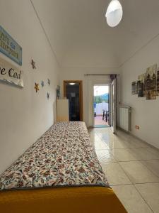 a large bed in a room with a large bed sidx sidx at Dimora Marisa in Termoli