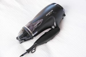 a hair dryer sitting on top of a table at KEI HOUSE Yamato 201 in Yamato
