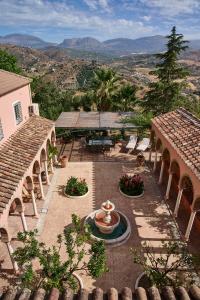 an aerial view of a courtyard with a fountain at Villa Camilla in Comares
