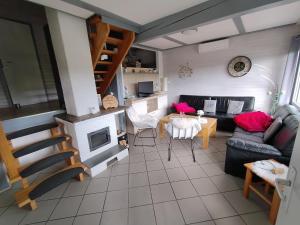an aerial view of a living room with a fireplace at Seeparkurlaub, Hessen in Kirchheim