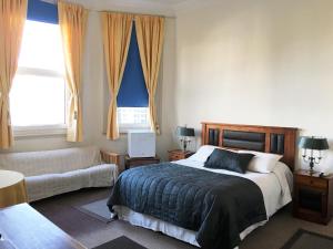 Cama ou camas em um quarto em Eco Hostal Offenbacher-Hof