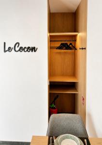 a room with a closet with a fan at Le Cocon Galhausen in Saint-Vith