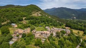an aerial view of a home in the mountains at Borda Viñuels in Planillo