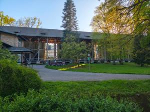 a large building with a park in front of it at Apartment Julia in Bad Orb