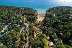an aerial view of a town with trees and a train at ESTRADA MOBILE HoME in Biograd na Moru