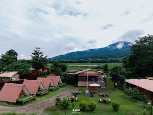 an aerial view of a resort with mountains in the background at ปัวเดอะมูน in Ban Fang