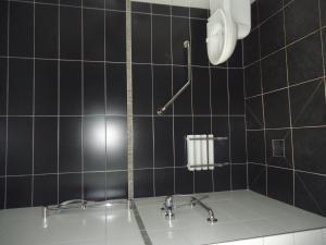 חדר רחצה ב-Source Hôtel