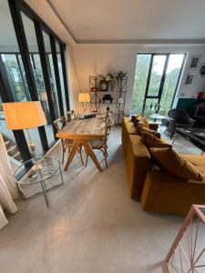 a living room with a couch and a table at Old Grain Mill in Eyemouth