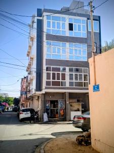 a tall building on the side of a street at Daryl House Liberte 2 in Dakar