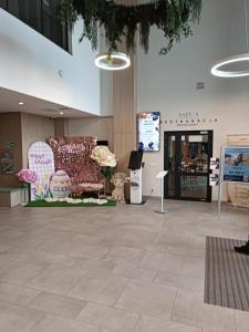 a lobby with a large room with a couch and tables at Bel Mare Aqua 2 F504 in Międzyzdroje +73 photos