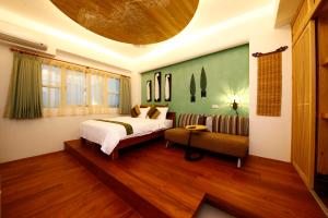 Letto o letti in una camera di Tang Chao B&B