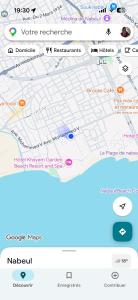 a screenshot of a cell phone with a map at Salmane Villa in Nabeul