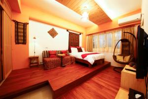 Letto o letti in una camera di Tang Chao B&B