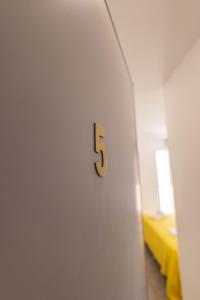 a room with a number on the wall at lovely cityscape in Lagos