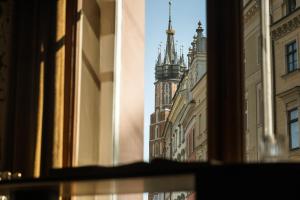 a view of a building from a window at The House 14 in Krakow +129 photos