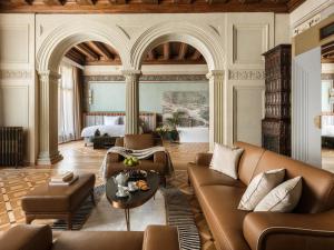a living room with a couch and a table at The House 14 in Krakow