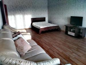 
Кровать или кровати в номере Апартаменты NG на Торосова
