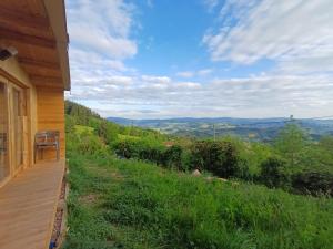 a view from the porch of a house at Grand Chêne in Saint-Racho