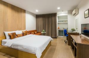 En eller flere senge i et værelse på BB Garden Resort + 34 billeder