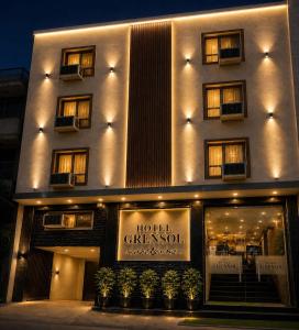 a hotel with a sign that reads hotel greenpool at Hotel GRAN-SOL Near DELHI Airport in New Delhi