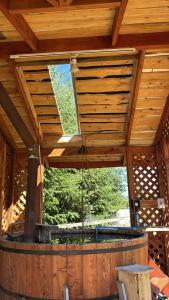 an outside view of a large wooden building with a large window at Lanco in Lanco