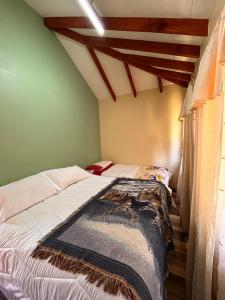 a bedroom with a large bed in a room at Lanco in Lanco