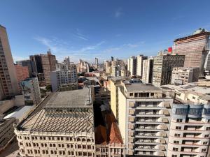 an aerial view of a city with tall buildings at Apartamento no lugar mais icônico -Edifício Tijucas- XV de Novembro in Curitiba