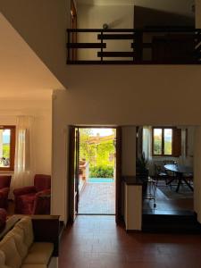 a living room with a couch and a table at LuminHouse Addaura Pool in Palermo +19 photos