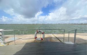 a life preserver on the side of a boat at 2 Bedroom Nice Ship In Lelystad in Lelystad