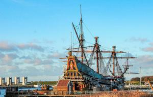 a large ship is being constructed on the water at 2 Bedroom Nice Ship In Lelystad in Lelystad +18 photos