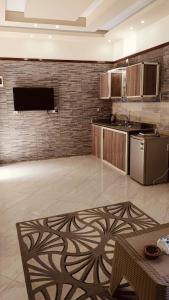 a kitchen with a stove and a counter top at The Palace Dahab in Dahab
