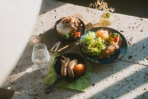 three dishes of food on a table with a glass at RoheN ASHINOKO in Hakone +46 photos