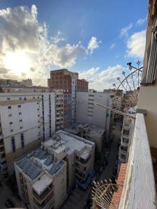a view of a city with tall buildings and a street at Bianki Home in Alexandria
