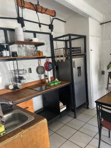 Kuhinja ili čajna kuhinja u objektu Baja Pacific Loft