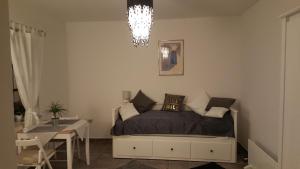 Кровать или кровати в номере Come to M2