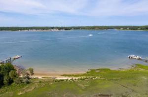 an aerial view of a large body of water at Buzzards Bay Family Beach Firepit CapeCodCanal in Bourne