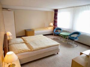 Lova arba lovos apgyvendinimo įstaigoje Wolfs Hotel